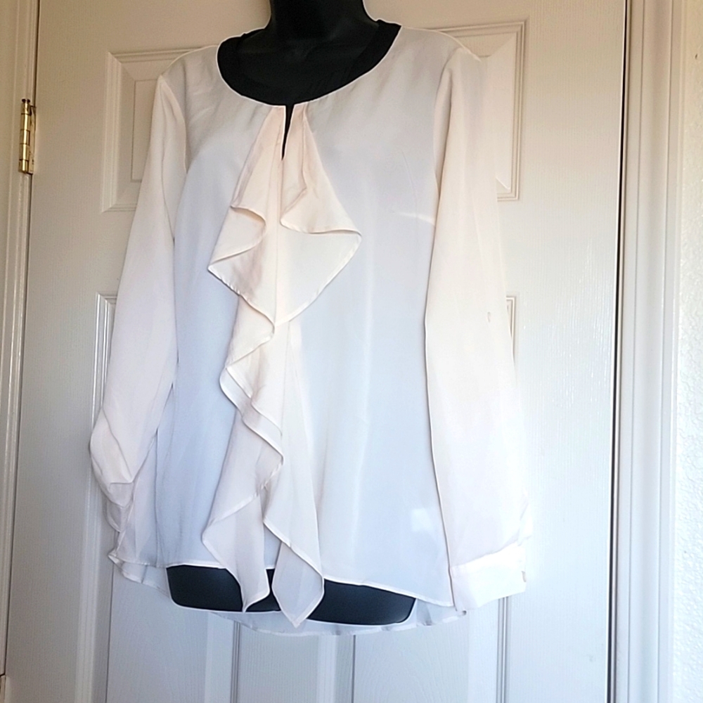 New York and Company cream ruffle blouse with black collar  size medium